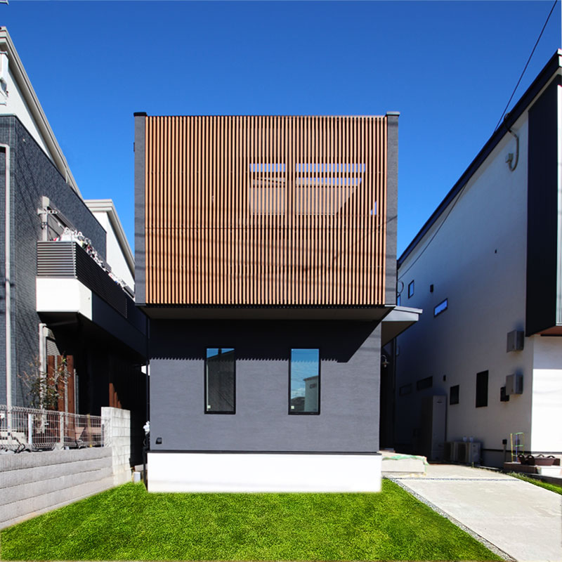 店舗と居住空間をつなげた勾配天井で2階リビングのある開放的な無垢の家