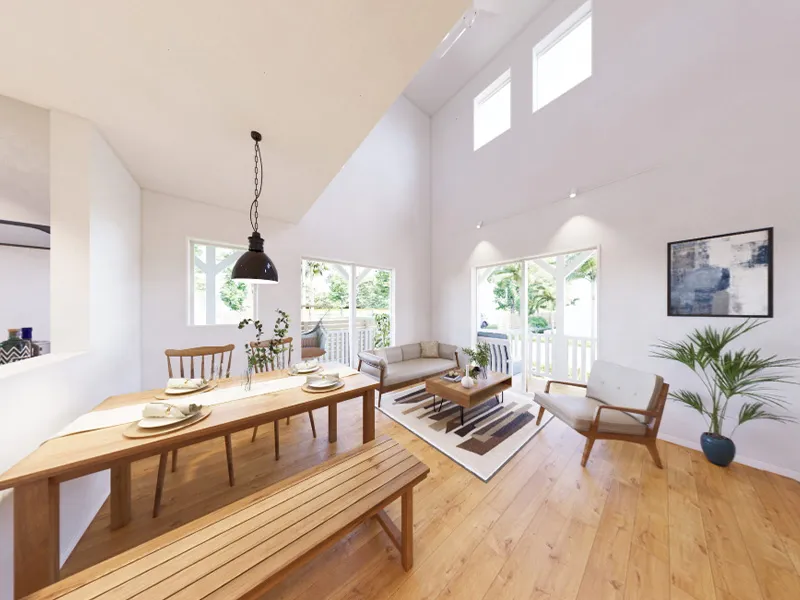 吹き抜けから優しい光が差し込むリビング